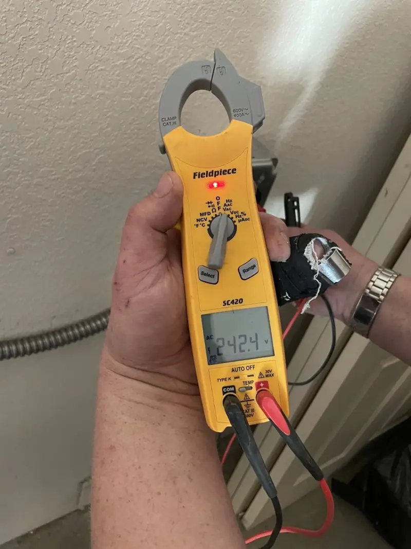 Voltage testing with clamp meter during Generator Installation in Port Royal